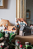 Painted model houses in Tiverton farmhouse  Devon  UK