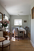 OPen plan dining room with wooden floor in East Barsham cottage  Norfolk  England  UK