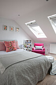 Grey double bed with skylight windows in South London Victorian terraced house