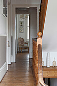 Wooden banister and floorboards in landing hallway of Brighton home, East Sussex, England, UK