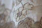 Embroidered floral fabric in Brighton home East Sussex England UK