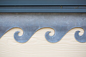 Decorative wave pattern on exterior of West Wittering home West Sussex England