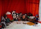 Selection of soft toys in playhouse in London family home  England  UK