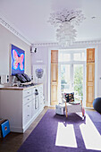 Mixing desk on sideboard in sunlit room of London townhouse  England  UK