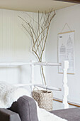Basket and indoor tree with wall hanging in West Yorkshire home  UK