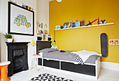 Grey  yellow and white teen room in modernised Preston home  Lancashire  England  UK
