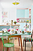 Assorted chairs at breakfast table in kitchen of East Riding of Yorkshire home  England  UK
