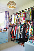 Assorted vintage blouses hang in dressing room of York home  England  UK