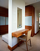 Dressing room with built in wardrobes and dressing table