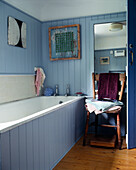 Blue panelled bath and chair