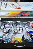 Tubes of oil paints and palette