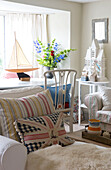 Modern pastel coloured living room with nautical themes