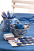 Still life with sewing items in indigo