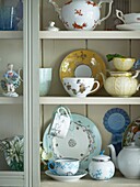 Dresser with display of mismatched crockery