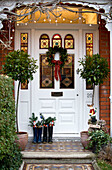 Front door decorated for Christmas