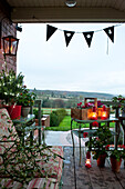 Mistletoe and bunting on porch of Hereford home