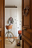 Bicycle in hallway of Paris apartment, France