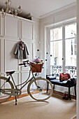 Bicycle in hallway of Paris apartment, France