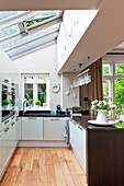 Kitchen with skylight in Middlesex family home, London, England, UK