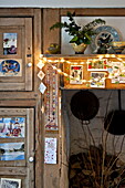 Fairylights and Christmas cards in farmhouse, Cornwall, England, UK