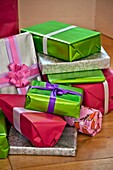 Gift-wrapped Christmas presents in Penzance family home Cornwall England UK