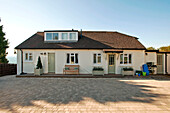 Single storey holiday home with paved driveway, Cornwall, UK
