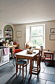 Wooden kitchen table in holiday cottage Cornwall UK