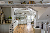 Beamed attic kitchen in Marazion beach house Cornwall UK