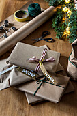 Christmas presents wrapped in brown paper with ribbon St Erth UK