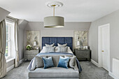 Calm neutrals in master bedroom of grade II-listed Victorian family home Godalming Surrey UK
