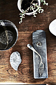 Bent fork and slate with vintage ceramics in Lyme Regis home Dorset UK