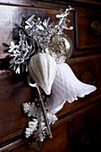 Origami bell with silver tinsel baubles and key