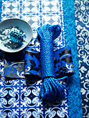 Blue string and assorted wrapping paper