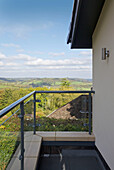 Balcony exterior with view over Somerset hills England UK