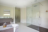 Spacious bathroom in contemporary farmhouse, Nuthurst, West Sussex, England, UK
