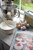 Mixing bowl with egg whites and recipe for meringues on windowsill of Kilndown home Cranbrook Kent England UK