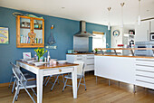 OPen plan kitchen and dining room in Hayling Island beach house Hampshire England UK