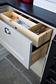 Open cutlery drawer in fitted Woodchurch kitchen Kent England UK