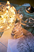 Lit fairylights with vintage glass in Faversham home at Christmas Kent England UK