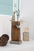 Animal sculpture and driftwood with pinecones in Dartmouth home Devon UK