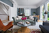 Chesterfield sofa with cable drum in Victorian Southsea living room UK