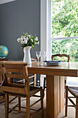 Oak dining table with mismatched vintage chairs Southsea UK