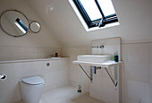 Freestanding bath in attic conversion of Sussex home UK