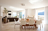 Open plan dining and living room in holiday villa, Republic of Turkey