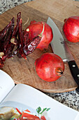 Chopping board with Knife Pomegranate and Chilli