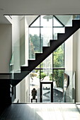Staircase in double height atrium of contemporary new build, Kingston upon Thames, England, UK
