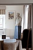 Historic bust on plinth in living room of Kent home, England, UK
