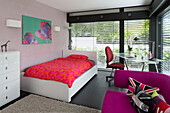 Single bed with desk and chair in contemporary SW London home, England, UK