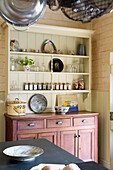 Wooden sideboard with kitchenware on kitchen dresser in Burwash home, East Sussex, England, UK