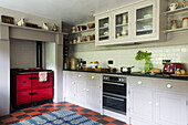 Red range oven in contemporary farmhouse kitchen Ceredigion Wales UK